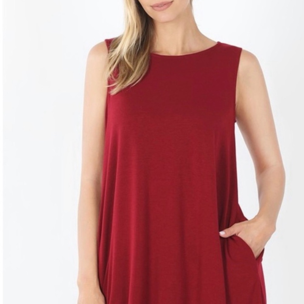 Red Sleeveless Flared Top with Pockets